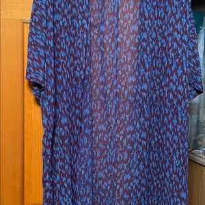 Below the knee caftan. Can be used as a bathing suit coverup or with jeans